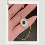 オーバル マザーオブパール &amp; ブルーサファイア ハロー ペンダント