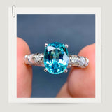 Vivid Blue Tourmaline and Diamond Halo Ring